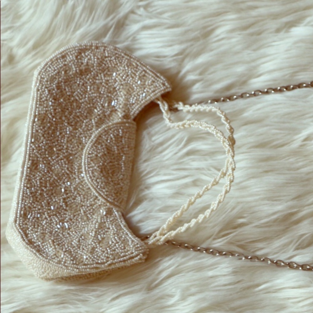Inge Christopher white sequin clutch